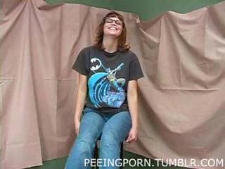 Petite nerdy girl peeing and spreading